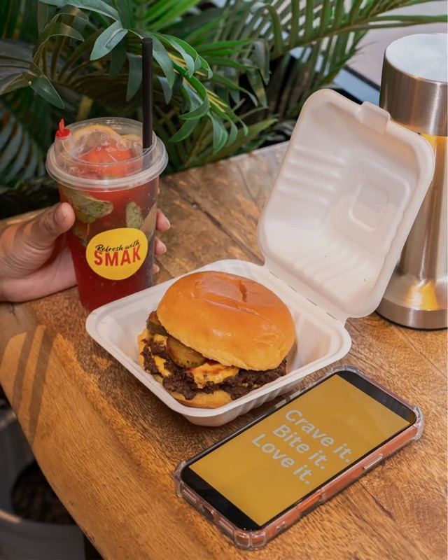 SMAK burger meal with a refreshing drink