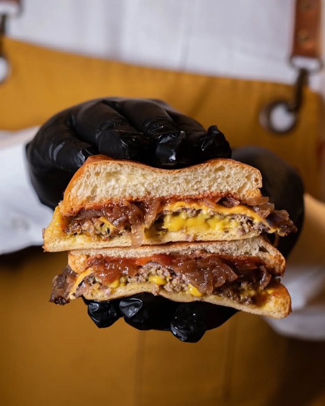 A juicy loaded burger, cross-section